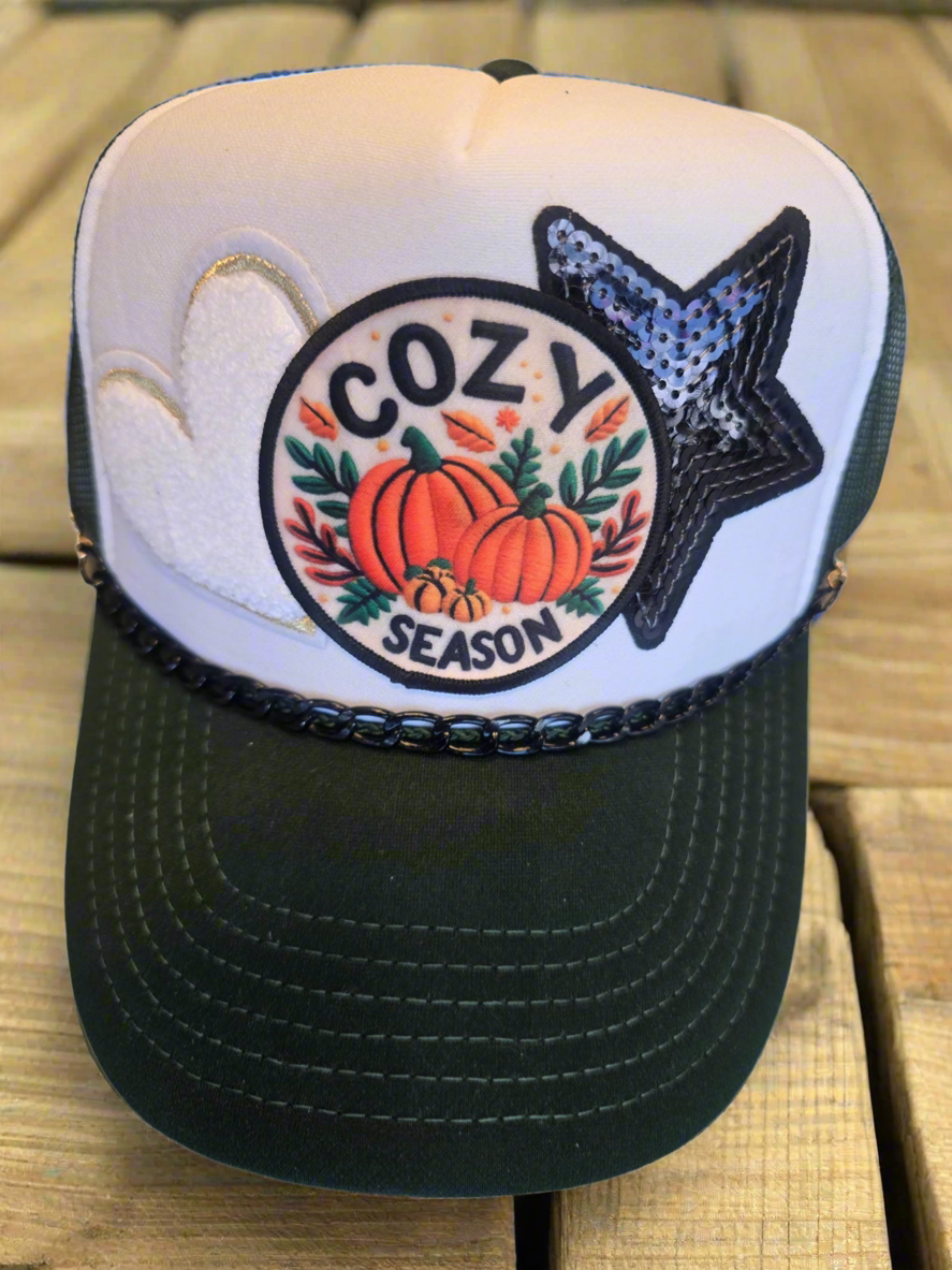 Cozy Season Fall Trucker Hat on wood boards