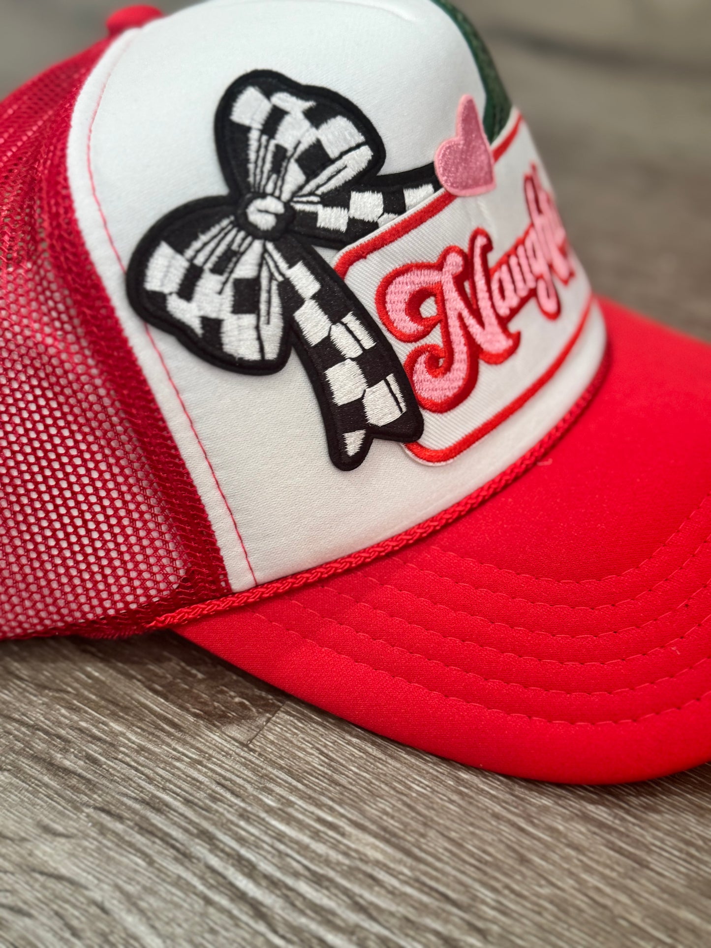 Naughty Checkered Bow Christmas Trucker Hat